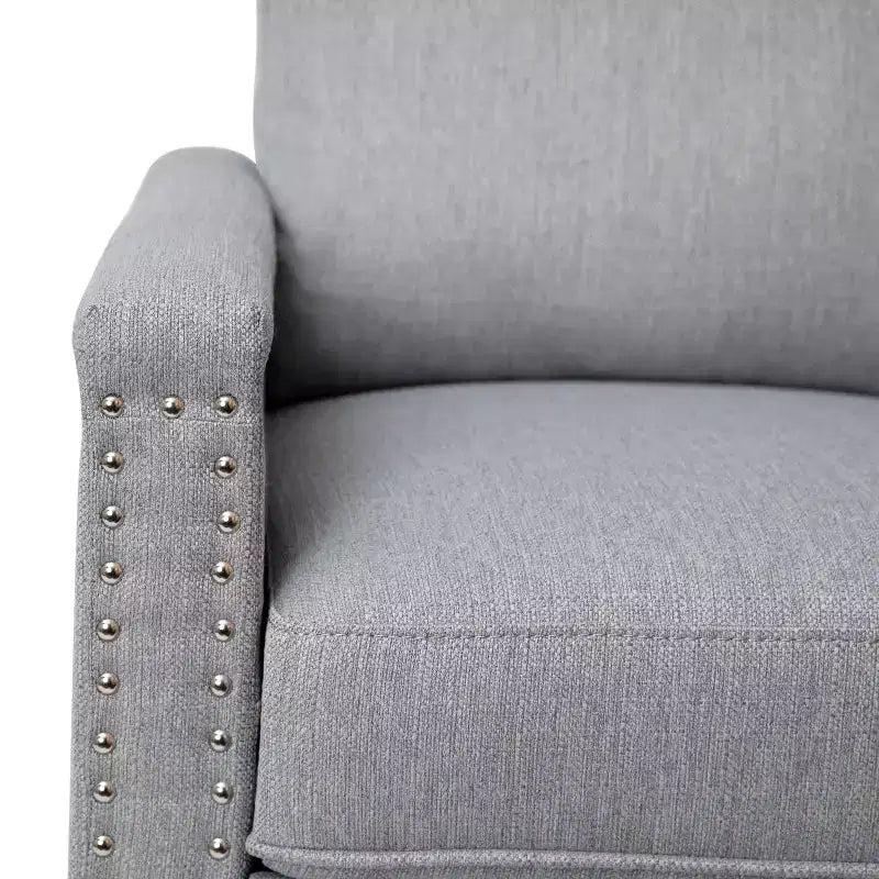 Fauteuil inclinable dossier poussoir en tissu gris / gris clair avec clous décoratifs, une place