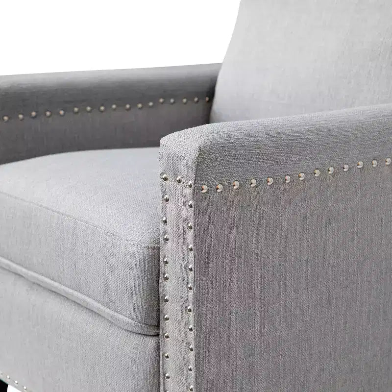 Fauteuil inclinable dossier poussoir en tissu gris / gris clair avec clous décoratifs, une place